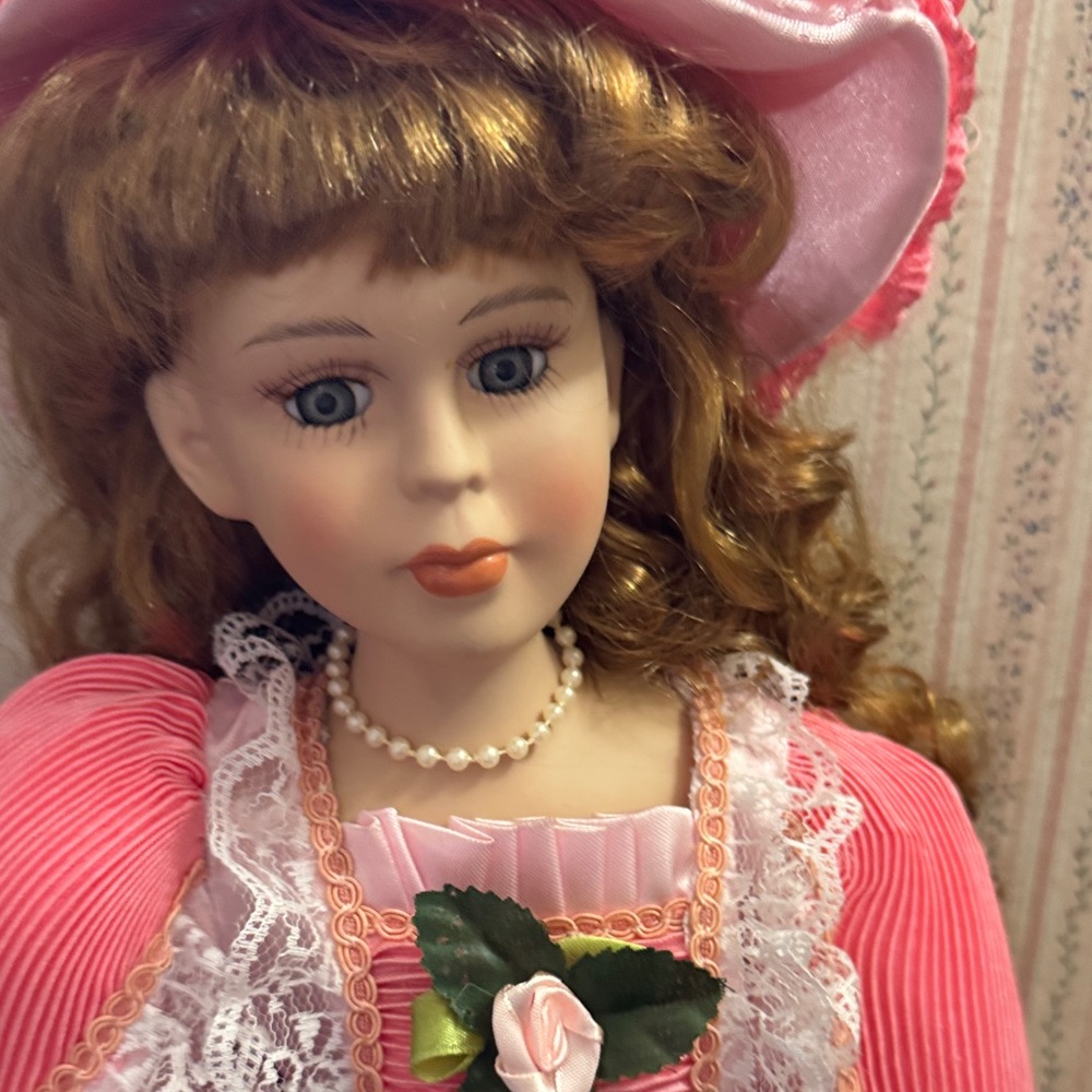 Elegant Pink Porcelain Doll with Hat